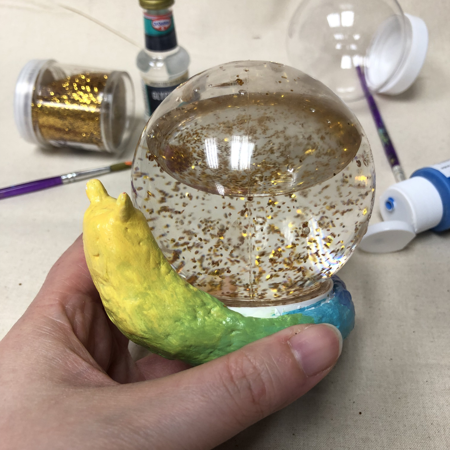 Kids Craft Workshops: Snail Snow Globe - Monday 3rd August