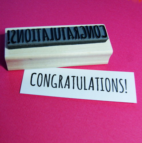 Skull & Cross Buns Artisan Rubber Stamp - Congratulations Skinny